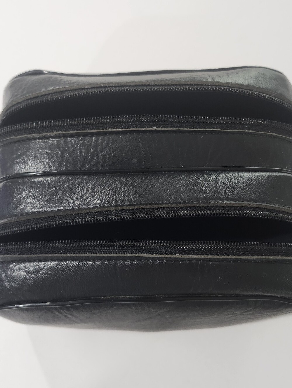 Black Leather 2 Pocket Zipper Travel Bag.  4" Deep 7.5" Long.